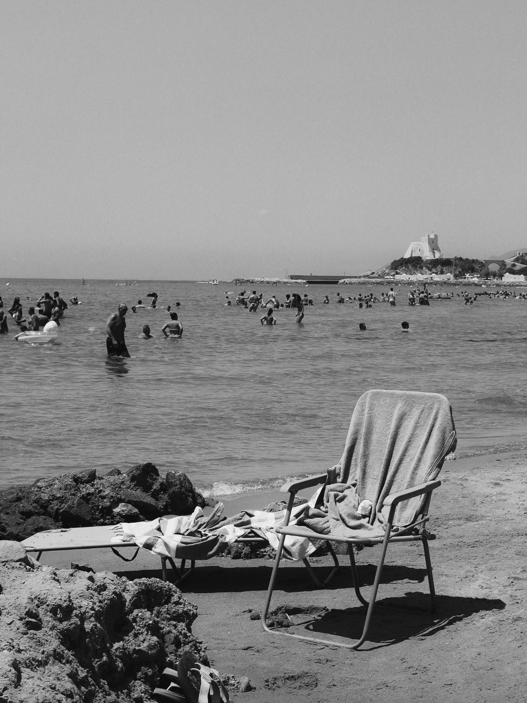 black and white image of a mediterranean beach in europe